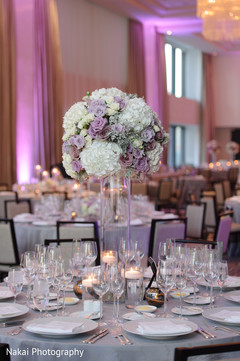 Floral arrangement details at the tables Floral arrangement details at the tables