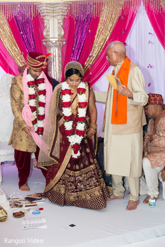 Indian bride and groom during the rituals Indian bride and groom during the rituals