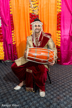 Indian groom holding the dhol Indian groom holding the dhol