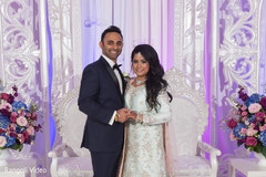 Elegant Indian bride and groom posing for photo shoot. Elegant Indian bride and groom posing for photo shoot.