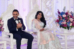 Indian bride and groom during the speeches Indian bride and groom during the speeches