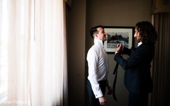Special guest helping the Indian groom with the tie Special guest helping the Indian groom with the tie