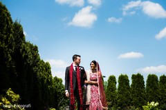 Indian bride and groom outdoors Indian bride and groom outdoors