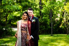 Indian lovebirds posing for pictures outside Indian lovebirds posing for pictures outside