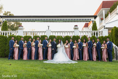 Indian newlyweds posing with special guests Indian newlyweds posing with special guests