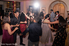 Vibrant indian pre wedding guests dance capture. Vibrant indian pre wedding guests dance capture.