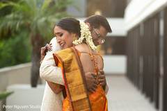 Indian relative hugging bride. Indian relative hugging bride.