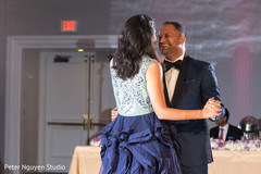 Lovely Indian couple enjoying their first dance capture. Lovely Indian couple enjoying their first dance capture.
