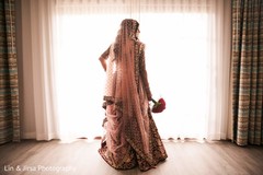 Marble Indian bride's red and golden lengha. Marble Indian bride's red and golden lengha.