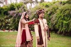 Cute Indian bride and groom's first look capture. Cute Indian bride and groom's first look capture.