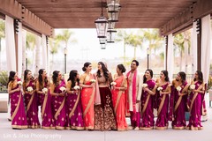 Sweet Indian bride, bridesmaids and groomsmen posing for photo. Sweet Indian bride, bridesmaids and groomsmen posing for photo.