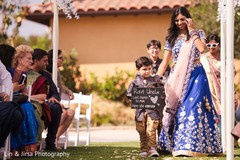 Lovely Indian guest boy announcing bride to come. Lovely Indian guest boy announcing bride to come.