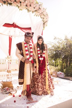 Indian groom stepping on nuts with toes. Indian groom stepping on nuts with toes.
