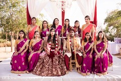 Indian wedding portrait with bride, groom, and bridesmaids. Indian wedding portrait with bride, groom, and bridesmaids.