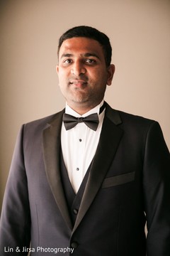 Enhancing groom ready for wedding reception. Enhancing groom ready for wedding reception.