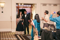 Indian lovebirds grand entrance to wedding reception Indian lovebirds grand entrance to wedding reception