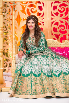 Indian bride posing for pictures wearing the lengha Indian bride posing for pictures wearing the lengha