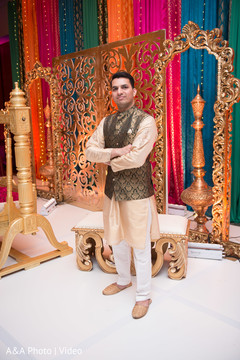 Indian groom at the venue posing for pictures Indian groom at the venue posing for pictures