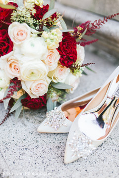 Incredible Indian bridal bouquet and stoned shoes capture. Incredible Indian bridal bouquet and stoned shoes capture.