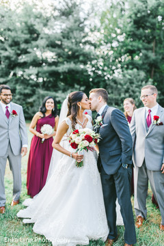 Lovely Indian groom kissing bride photo session. Lovely Indian groom kissing bride photo session.