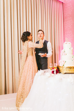 Indian bride giving cake to the groom lovely capture. Indian bride giving cake to the groom lovely capture.