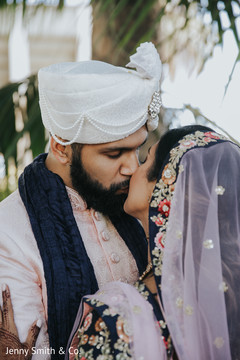 Indian groom kissing the Maharani Indian groom kissing the Maharani