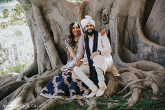 Joyful Indian lovebirds posing for the cameras Joyful Indian lovebirds posing for the cameras