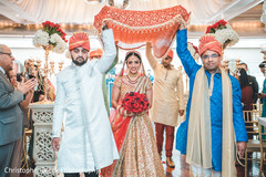 Stunning Indian bride being escorted by family Stunning Indian bride being escorted by family