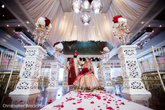 Indian couple posing under the decor Indian couple posing under the decor
