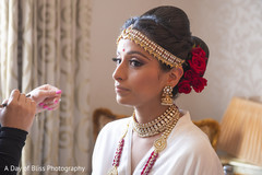Beautiful Indian bride being dolled up for her ceremony. Beautiful Indian bride being dolled up for her ceremony.