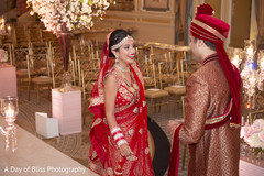 Sweet and lovely Indian bride's and groom's first look scene. Sweet and lovely Indian bride's and groom's first look scene.