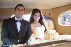 Beautiful Indian bride and groom inside their ride Beautiful Indian bride and groom inside their ride