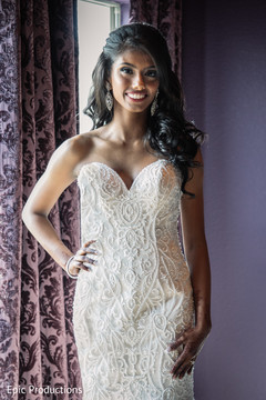 Lovely Indian bride on her white wedding dress. Lovely Indian bride on her white wedding dress.