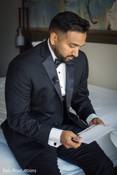 Enchanting Indian groom about to read bride's letter. Enchanting Indian groom about to read bride's letter.