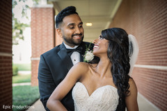 Lovely Indian couple on their ceremony wedding outfits. Lovely Indian couple on their ceremony wedding outfits.