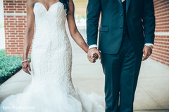 Joyful Indian bride and groom holding hands capture. Joyful Indian bride and groom holding hands capture.