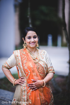 Enchanting Indian bride posing with sangeet lehenga. Enchanting Indian bride posing with sangeet lehenga.