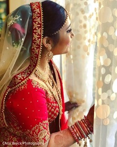 Indian bride looking out the window capture. Indian bride looking out the window capture.