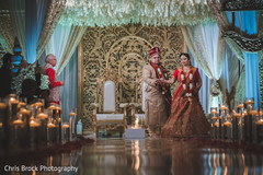 Indian bride and groom walking around sacred fire. Indian bride and groom walking around sacred fire.