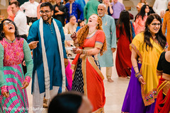 Indian bride having a laugh during the pre wedding rituals Indian bride having a laugh during the pre wedding rituals
