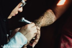 Marvelous Indian bride mehndi art done on her hands. Marvelous Indian bride mehndi art done on her hands.
