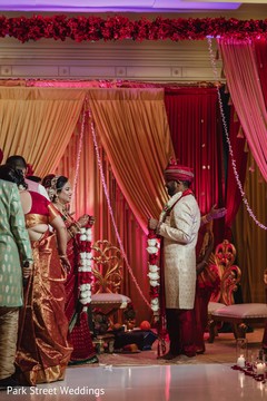 Indian bride and groom at their Jaimala Ceremony. Indian bride and groom at their Jaimala Ceremony.