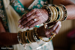 Marvelous Indian bride putting her bangles on. Marvelous Indian bride putting her bangles on.