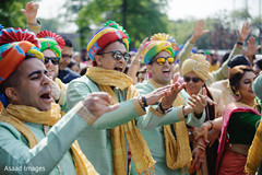 Cheerful Indian groomsmen at baraat celebration. Cheerful Indian groomsmen at baraat celebration.