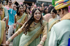 Joyful indian bridesmaids showing some dance moves. Joyful indian bridesmaids showing some dance moves.