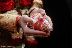 India broom holding the hazelnut ritual item. India broom holding the hazelnut ritual item.