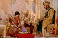Indian parents making offerings to sacred fire. Indian parents making offerings to sacred fire.