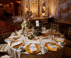 Elegant Indian wedding reception table setup. Elegant Indian wedding reception table setup.