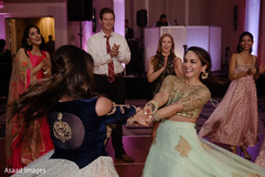 Indian wedding guests dancing the night away. Indian wedding guests dancing the night away.