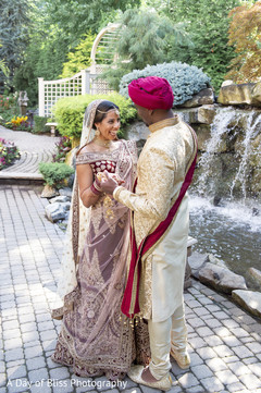 Indian bride staring at Raja prior to the ceremony Indian bride staring at Raja prior to the ceremony